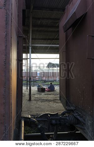 Thazi, Myanmar - 23 November, 2018: Vertical Picture Of Burmese People Waiting Train At Thazi Train 