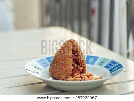 Sicilian Snack, Fried Ball Of Rice Arancino On A Plate, Tipical Street Food Of Sicily