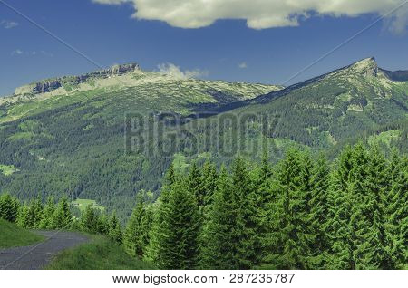 Hiking Trail In The Kleinwalsertal With View Onto The Hohen Ifen.