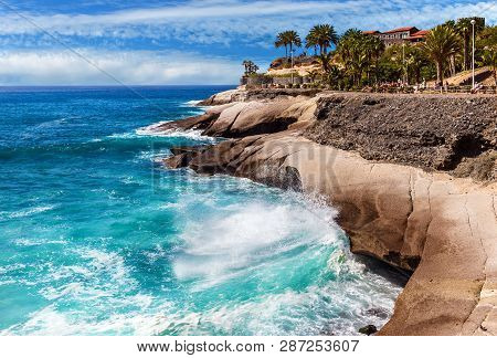 Costa Adeje, Tenerife, Spain - February 7, 2019: View Of The Rocky Cost And The Famous Casa Del Duqu