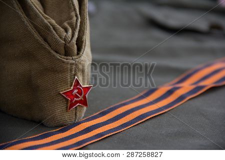 Part Of The Uniform Of The Soviet Soldier On The Day Of Victory: Forage-cap And St. George Ribbon.