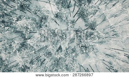 Aerial View Top Down Fly Over Shot Of Winter Spruce And Pine Forest. Trees Covered With Snow, Rising