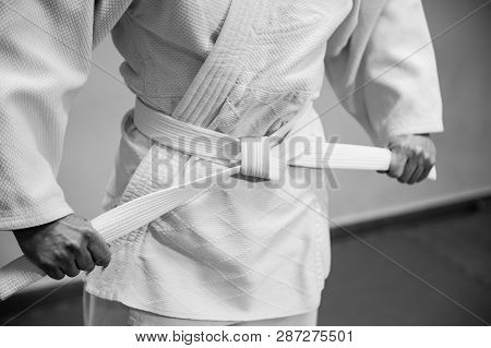 Young Girl Dressed In Hakama Practicing Aikido.