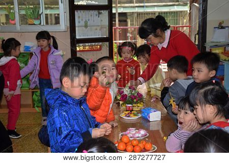 Canton, China - Circa March 2019: Kids In Kindergarten Calebrate A Birthday. Birthday Party In Kinde