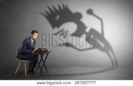 Man working hard and he is afraid of a yelling shadow