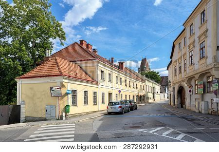 Perchtoldsdorf, Austria - July 16, 2017. Winding Street Leading To The Medieval Fortified Tower. Mar