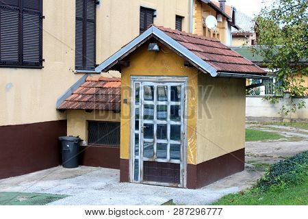 Unusual Glass Door Family House Basement Entrance Removed From Main Building And Made To Look Like S