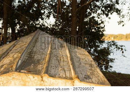 Upside Down Rowboat On Australian River Bank