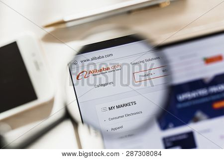 New York, Usa - 4 March 2019: Alibaba Group Official Website Homepage Under Magnifying Glass. Concep