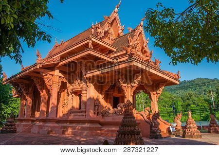 Red Clay Temple - Wat Ratchathammaram On Koh Samui Island, Thailand Under Trees