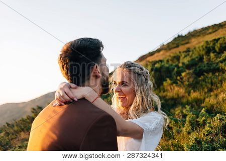 Romantic Date Lovers Bride And Groom In The Mountains.