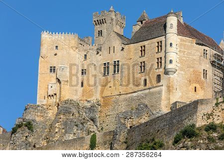 The Medieval Chateau De Beynac Rising On A Limestone Cliff Above The Dordogne River. France, Dordogn
