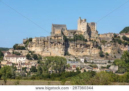 The Medieval Chateau De Beynac Rising On A Limestone Cliff Above The Dordogne River. France, Dordogn
