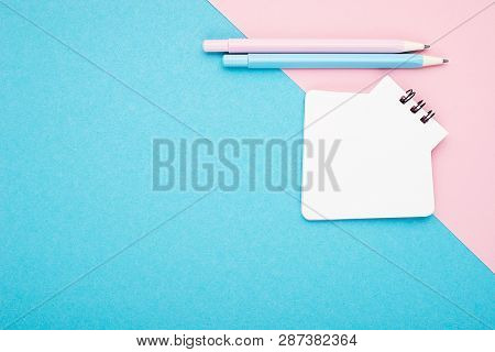 Empty Notebook Or Notepad On Pink And Blue Background With A Double Color Stationery. Creative Minim