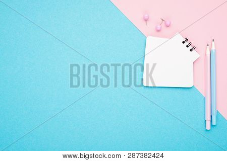 Empty Notebook Or Notepad On Pink And Blue Background With A Double Color Stationery. Creative Minim