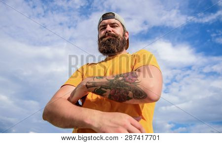 Lumbersexual Tattooed Well Groomed Hipster. Hipster With Mustache And Long Beard. Too Serious Right 