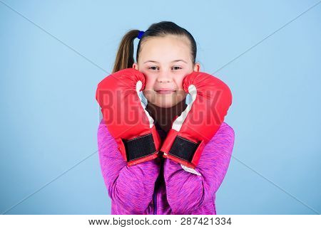 Boxer Child In Boxing Gloves. Female Boxer. Sport Upbringing. Boxing Provide Strict Discipline. Girl
