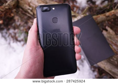 Modern Mobile Phone With Large Screen, Close-up And Assembly Details