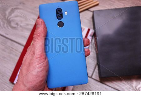Modern Mobile Phone With Large Screen, Close-up And Assembly Details