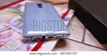 Modern Mobile Phone With Large Screen, Close-up And Assembly Details