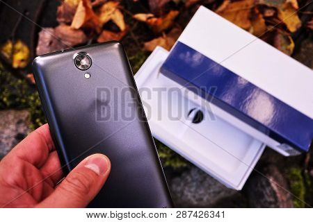 Modern Mobile Phone With Large Screen, Close-up And Assembly Details