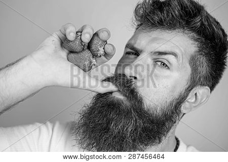 Fresh Juice Concept. Man Strict Face Enjoy Fresh Drink Strawberry Juice. Man Drinks Strawberry Juice