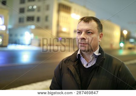 Man On Street In Night City