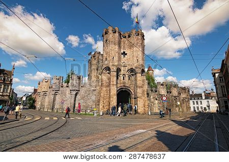 Ghent, Belgium-may 03, 2018:square With Open Air Cafes. Ancient Castle Of The Counts (dutch: Gravens