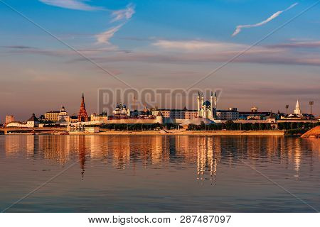 Kazan Kremlin In Sunset Light Reflecting On Water Surface