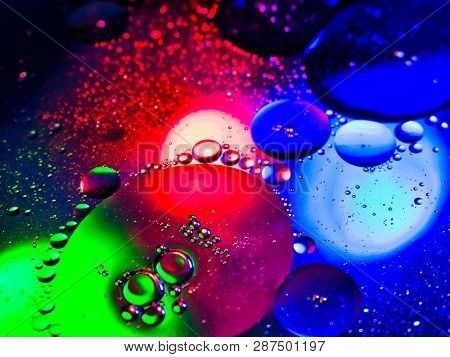 Multcolored Rgb Red Green Blue Lights Through Oil Bubbles Abstract Liquid Detail