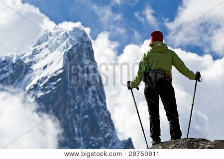 Woman Hiking In Mountains