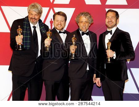 Ian Hunter, J.D. Schwalm, Paul Lambert and Tristan Myles at the 91st Annual Academy Awards - Press Room held at the Loews Hotel in Hollywood, USA on February 24, 2019.