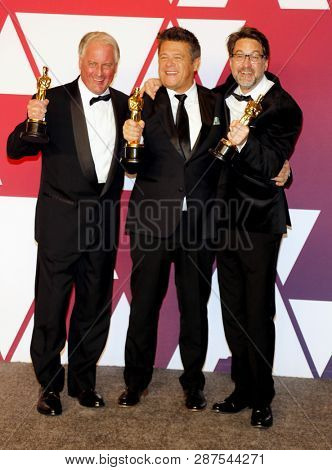 Paul Massey, Tim Cavagin and John Casali at the 91st Annual Academy Awards - Press Room held at the Loews Hotel in Hollywood, USA on February 24, 2019.