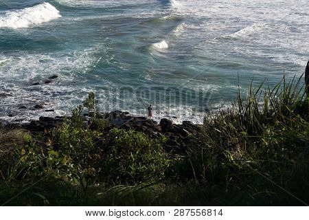 Ocean View From Sea-cliff With Man Rock Fishing