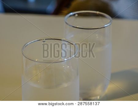Glass Of Fresh And Clear Water On The Table At Restaurant.