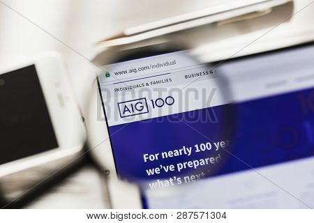 New York, Usa - 6 March 2019: American International Group, Aig Official Website Homepage Under Magn