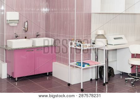 Modern And Comfortable Equipped Hospital Room. Treatment Room With Medicine In The Fridge.