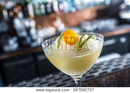 Cocktail Drink Frozen Margarita At Barcounter In Night Club Or Restaurant.