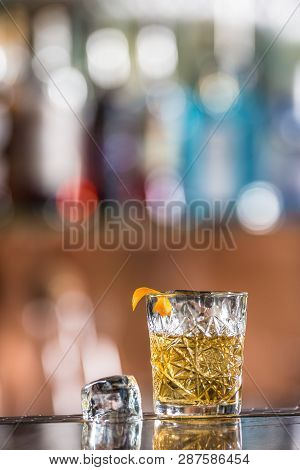 Cocktail Drink Old Fashioned At Barcounter In Night Club Or Restaurant.