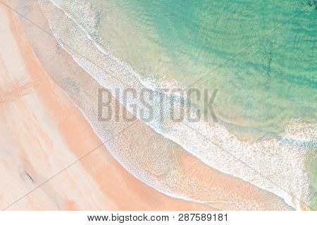 Freshwater Beach Waves With Morning Sunlight Hitting The Water. Seagulls Play In The Shallows