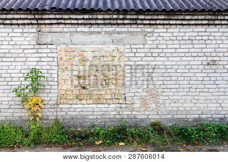 Old Gungy White Brick Wall With Bricked Up Window