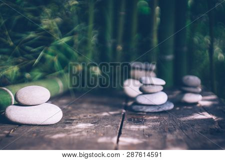 Spa Background With Woman's Hands And Clear Water On An Old Wooden Table. Japanese Style. Simplicity