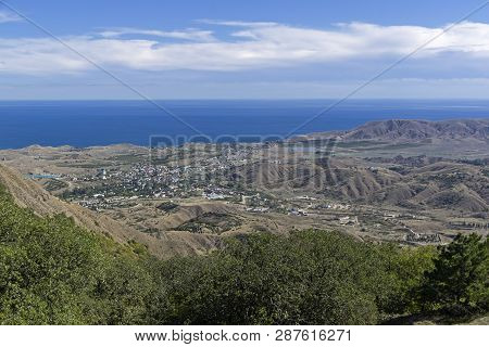 View Of The Village Of Sunny Valley From The Slope Of The Tokluk Mountain Range. Crimea, Sunny Day I