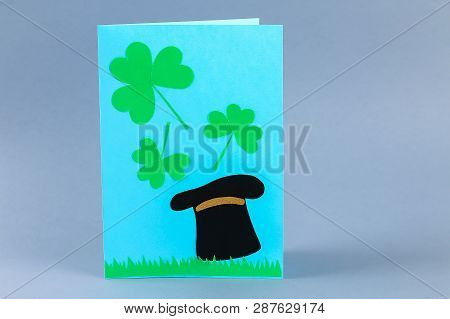Diy St. Patricks Day Greeting Card Made Of Cardboard And Paper Clovers On A Gray Background. Gift Id