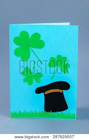 Diy St. Patricks Day Greeting Card Made Of Cardboard And Paper Clovers On A Gray Background. Gift Id