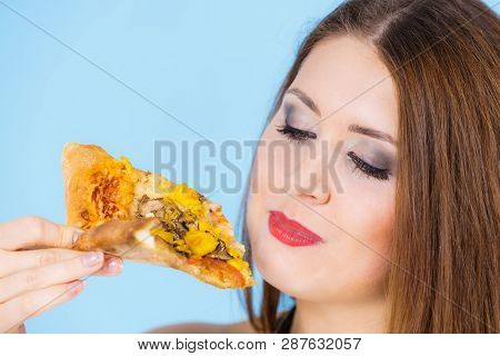 Woman Eating Hot Pizza Slice