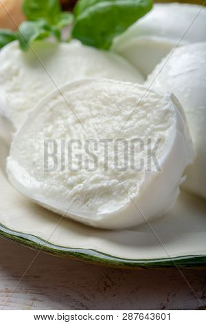 Balls And Pieces Of Buffalo Mozzarella, Soft Italian Scheese Made From The Milk Of Italian Mediterra
