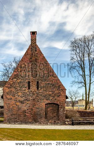 A Small House On The Courtyard Grounds Of The Church Of Saint Mary In The Old Town Of Helsingor In D