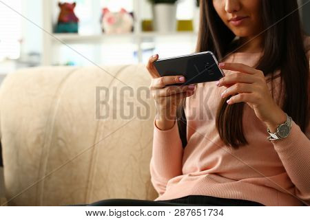 Minsk, Belarus - February 16, 2019 : Woman Holding Smartphone Samsung Galaxy S8 In Hand Illustrative