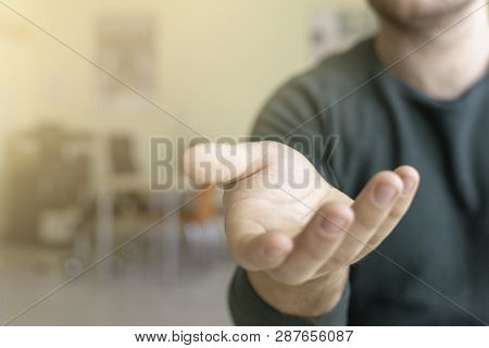 Businessman Extending Hand, Selective Focus And Shallow Depth Of Field.